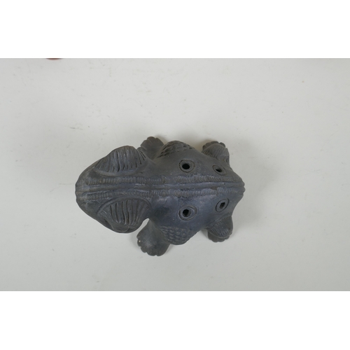 212 - A pre Colombian style pottery ocarina in the form of a frog, and three similar terracotta figures, l... 