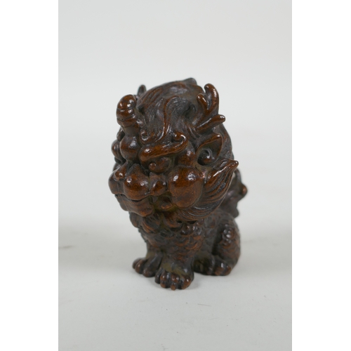 216 - An oriental cast bronze stylised kylin, 6cm high