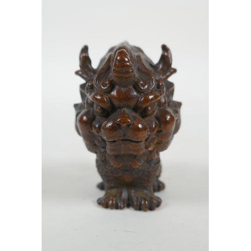 216 - An oriental cast bronze stylised kylin, 6cm high