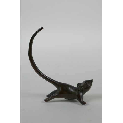 218 - A Japanese style bronze okimono rat, 7cm high