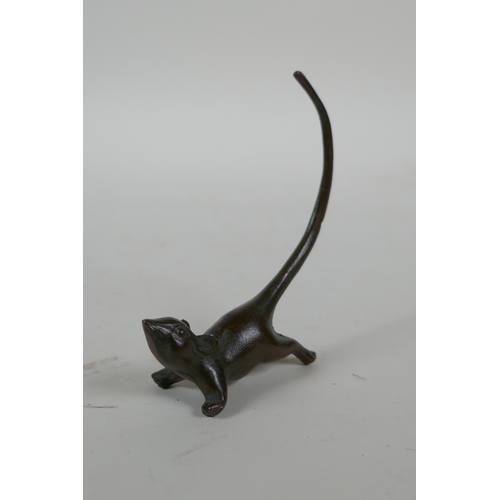 218 - A Japanese style bronze okimono rat, 7cm high