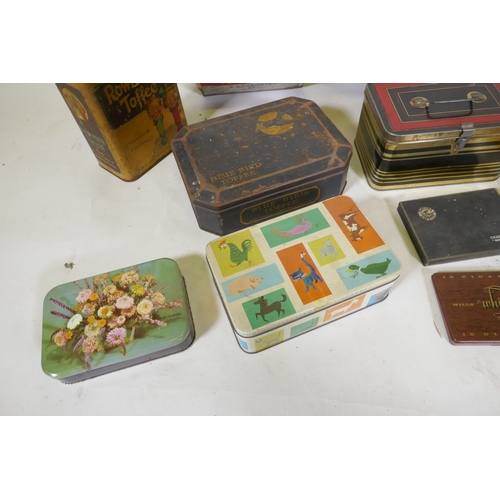 219 - A quantity of vintage biscuit cigarette and toffee tins, largest 22 x 25cm