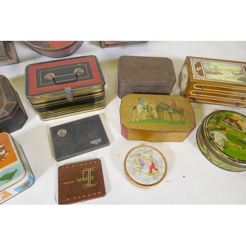 219 - A quantity of vintage biscuit cigarette and toffee tins, largest 22 x 25cm