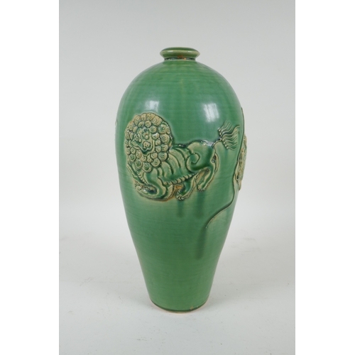 223 - A Chinese celadon glazed porcelain vase with raised kylin decoration, 31cm high