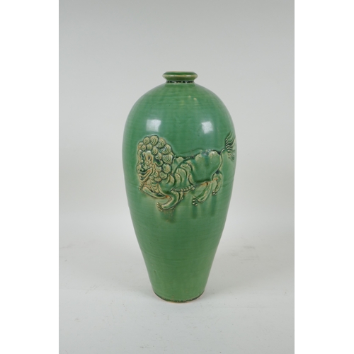 223 - A Chinese celadon glazed porcelain vase with raised kylin decoration, 31cm high