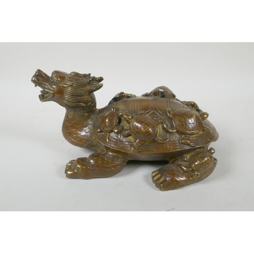 228 - A Chinese filled brass longgui (dragon turtle) with tortoise on its back, Xuande 6 character mark to... 