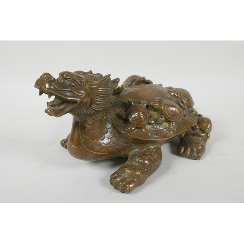 228 - A Chinese filled brass longgui (dragon turtle) with tortoise on its back, Xuande 6 character mark to... 