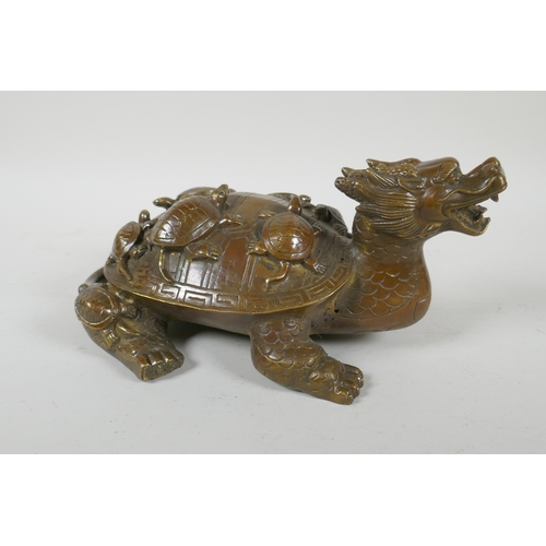 228 - A Chinese filled brass longgui (dragon turtle) with tortoise on its back, Xuande 6 character mark to... 