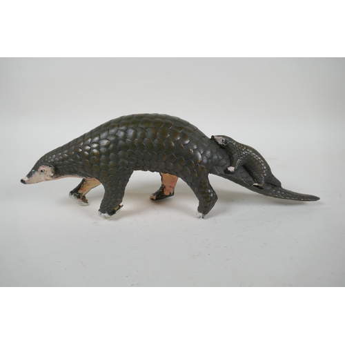 229 - A cold painted bronze pangolin and its offspring, 32cm long