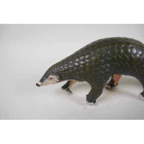 229 - A cold painted bronze pangolin and its offspring, 32cm long