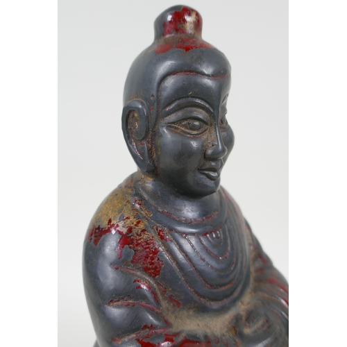 232 - A Chinese cast metal figure of an emperor seated on a throne, with the remnants of gilt patina, char... 