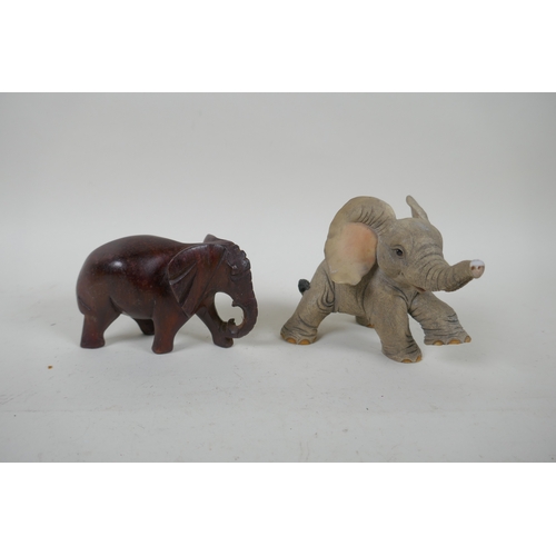 235 - A quantity of carved stone, wood and composition African animals, largest 16cm