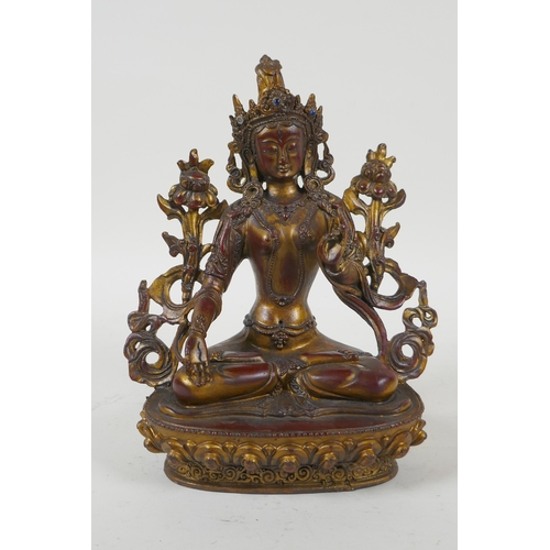 241 - A Sino Tibetan gilt and coppered bronze of the Green Tara, 20cm high