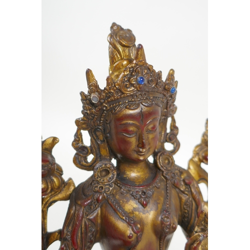 241 - A Sino Tibetan gilt and coppered bronze of the Green Tara, 20cm high