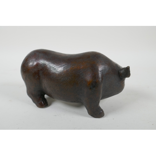 244 - A filled bronze model of a sow, 19cm  long