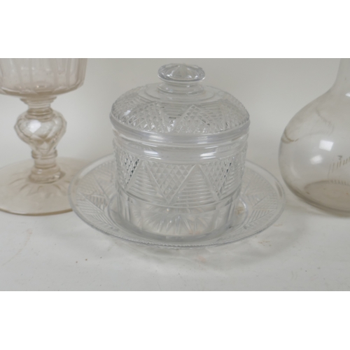 256 - A Victorian cut glass jar and cover with dish, a carafe and etched goblet, 22cm high