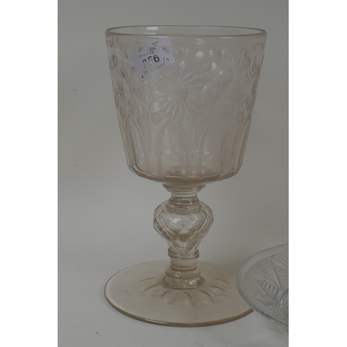 256 - A Victorian cut glass jar and cover with dish, a carafe and etched goblet, 22cm high