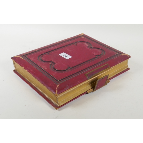 258 - A Victorian leather bound photograph album, 30 x 23 x 6cm