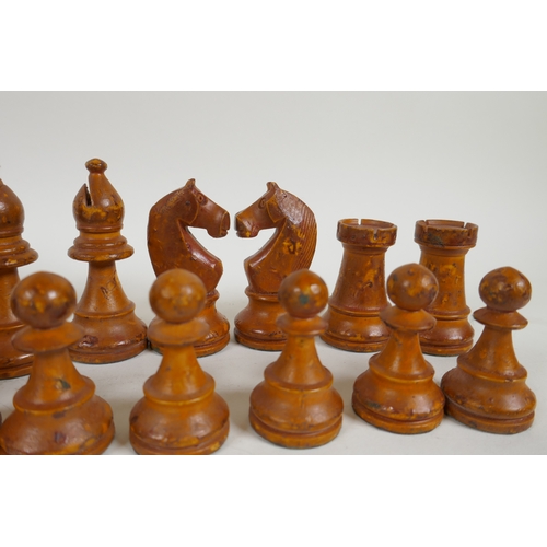 259 - A late C19th/early C20th Staunton pattern boxwood and ebony chess set, king 9cm high