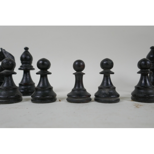 259 - A late C19th/early C20th Staunton pattern boxwood and ebony chess set, king 9cm high