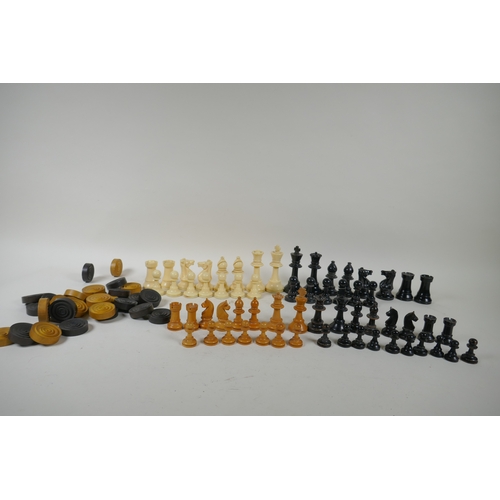 260 - A box wood and ebony chess set, king 7cm high, and an early C20th composition set, king 9cm high, bo... 