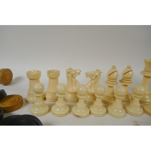 260 - A box wood and ebony chess set, king 7cm high, and an early C20th composition set, king 9cm high, bo... 