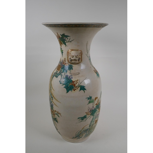 265 - A Japanese Meiji Satsuma vase, with twin mask handles, decorated with a phoenix in flight, 48cm high