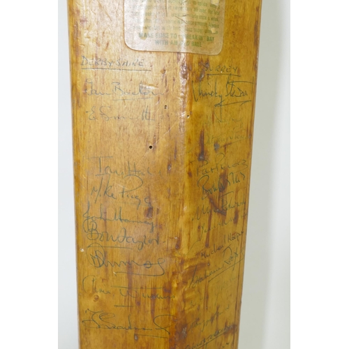 284 - A Slazenger cricket bat, signed with players autographs, Pakistan 1971, Derbyshire, Surrey, Glamorga... 