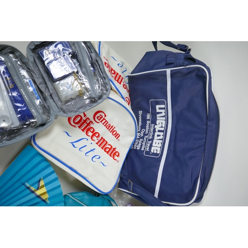 29 - A collection of vintage flight bags including BOAC, UniGlobe, Air Berlin etc, a complete flight vani... 