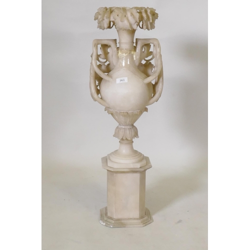 296 - A Victorian alabaster urn on stand, urn 77cm high