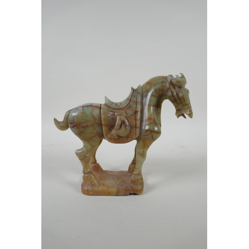 30 - A Chinese carved celadon jade Tang style horse, 18cm high