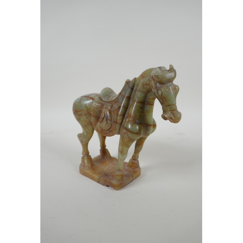 30 - A Chinese carved celadon jade Tang style horse, 18cm high