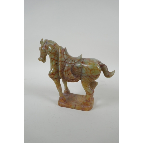 30 - A Chinese carved celadon jade Tang style horse, 18cm high