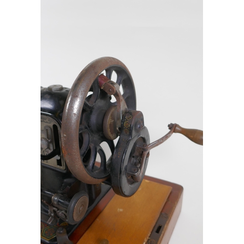 305 - A vintage Hexagon handcrank sewing machine, manufactured by the Standard Sewing Machine Co, Clevelan... 