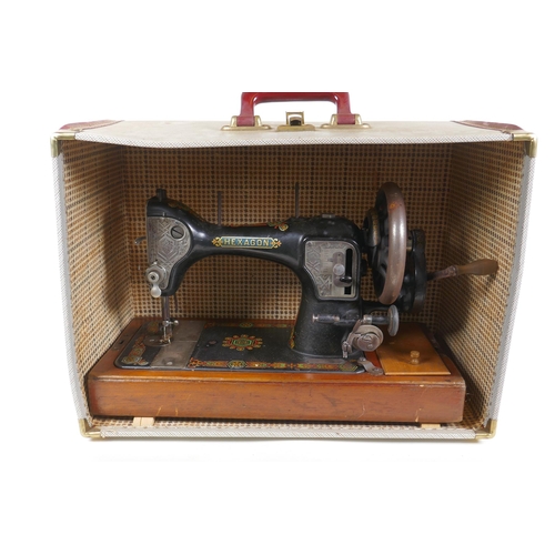 305 - A vintage Hexagon handcrank sewing machine, manufactured by the Standard Sewing Machine Co, Clevelan... 