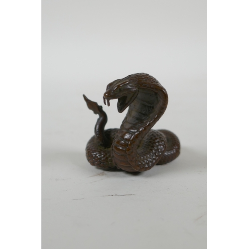 42 - A Japanese style bronze okimono cobra, 4cm high