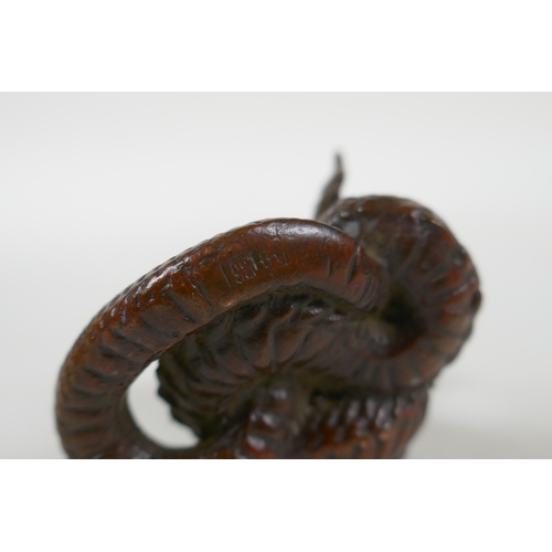 42 - A Japanese style bronze okimono cobra, 4cm high