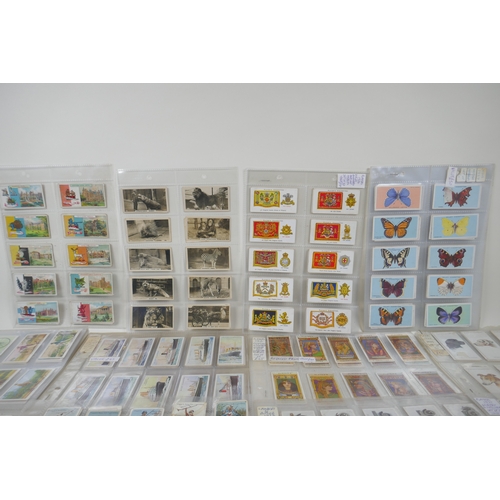 43 - A large quantity of early C20th cigarette cards, mostly Players, to include Indian Empire scenes, lu... 