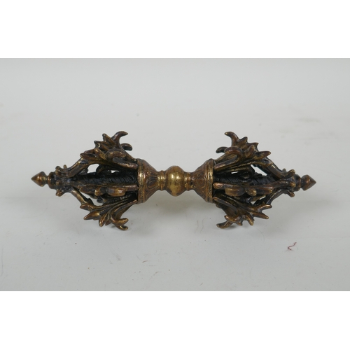 45 - A Tibetan bronzed metal vajra, 16cm long