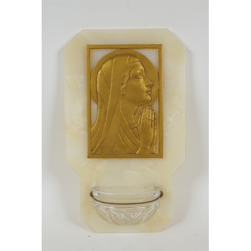 47 - A vintage onyx stoup mounted with a gilt brass portrait of the Madonna in prayer, inscribed Tschudin... 