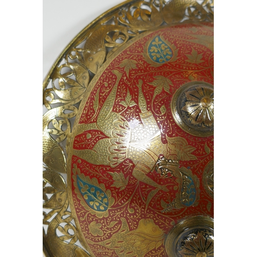 5 - A Murghal bronze shield with enamelled lion hunt decoration, the pierced rim decoration with fish, 3... 