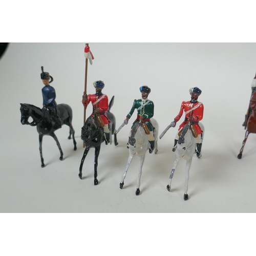 53 - A quantity of Britains lead soldiers, mostly Cavalry units, and some miscellaneous metal figures, 8c... 