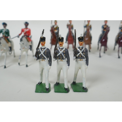 53 - A quantity of Britains lead soldiers, mostly Cavalry units, and some miscellaneous metal figures, 8c... 