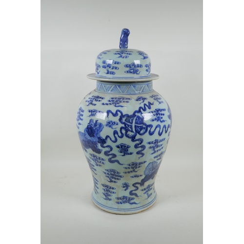 58 - A Chinese blue and white porcelain jar and cover, decorated with kylin, 53cm high