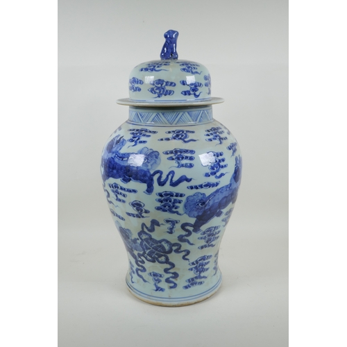 58 - A Chinese blue and white porcelain jar and cover, decorated with kylin, 53cm high