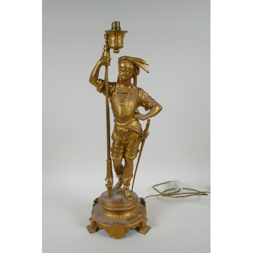 59 - A gilt metal table lamp in the form of a cavalier, 44cm high