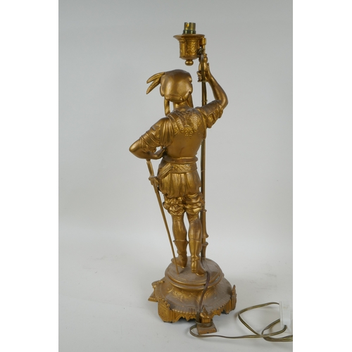 59 - A gilt metal table lamp in the form of a cavalier, 44cm high