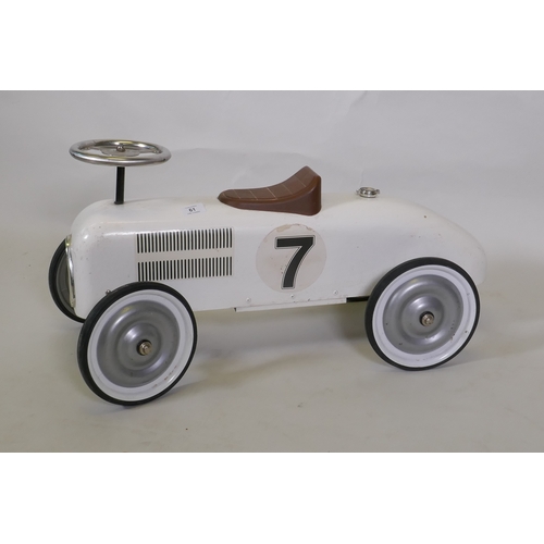 61 - A child's toy metal racing car, 72cm long