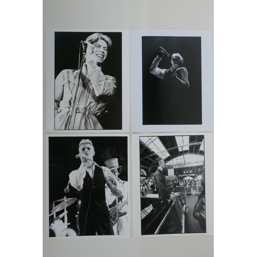 72 - Four 1970s black and white press photographs of David Bowie including one photographed by Andy Kent,... 