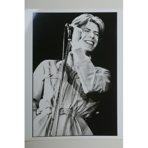 72 - Four 1970s black and white press photographs of David Bowie including one photographed by Andy Kent,... 